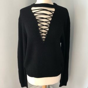 Poof! Lace up black sweater